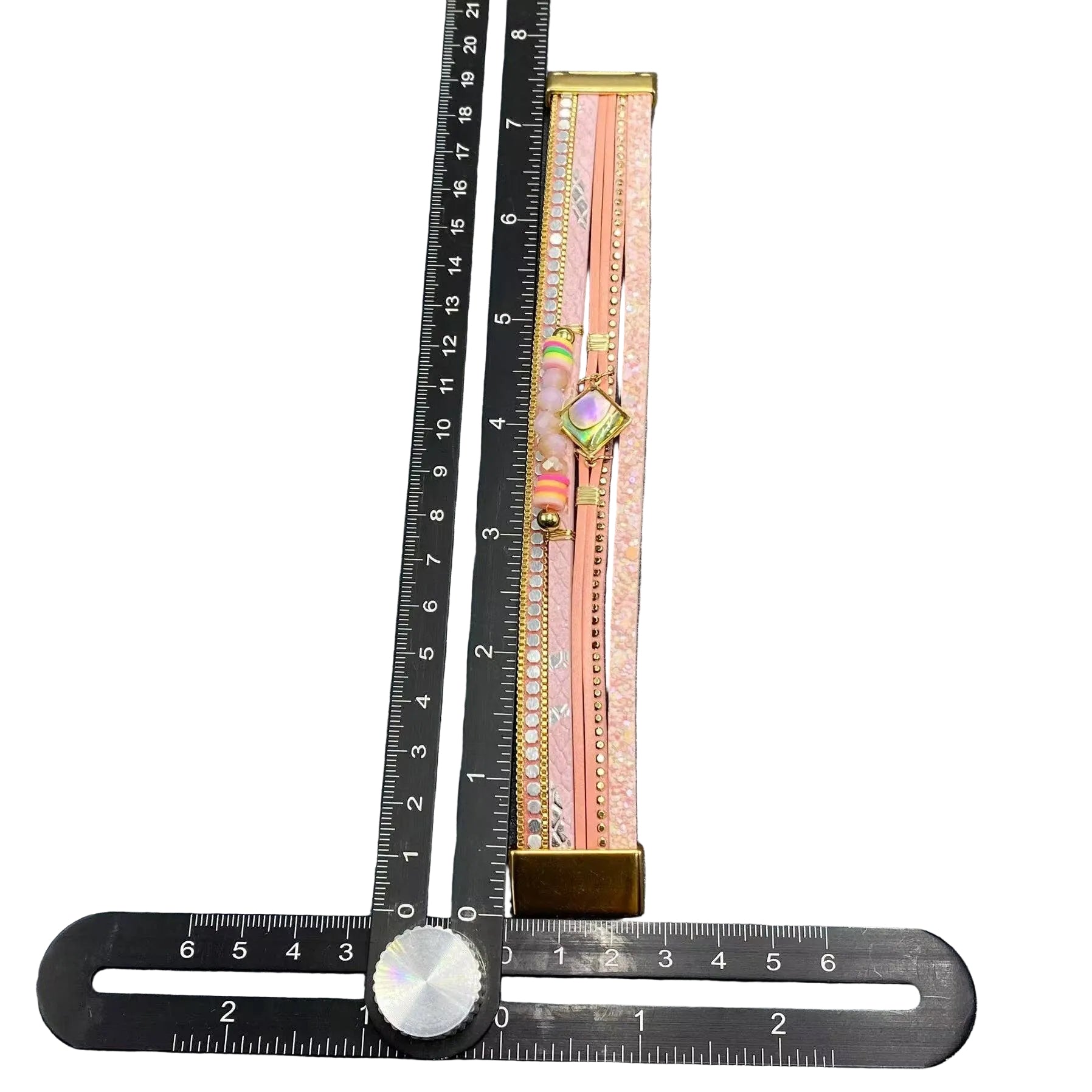 bracelet measured by a ruler.