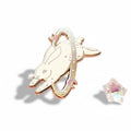 cosmic white rabbit enamel pin with rhinestones on a pink background