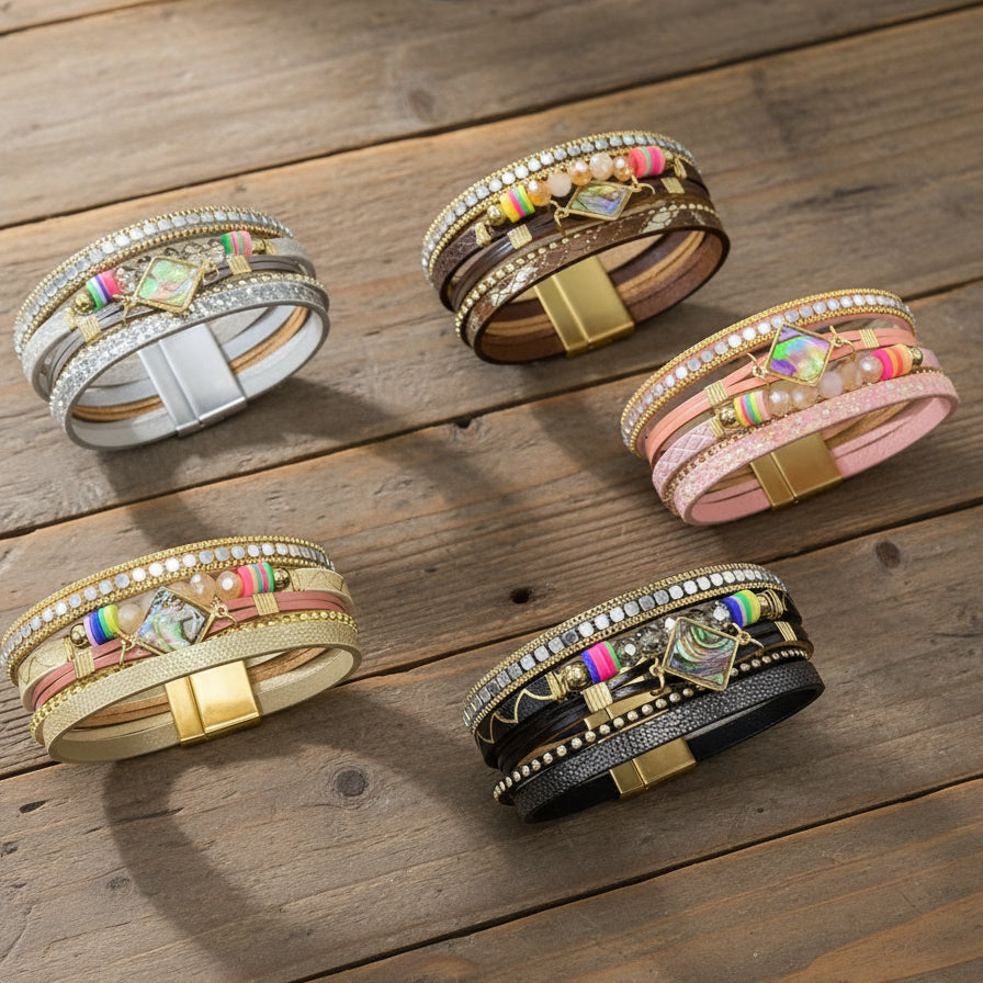 Set of colorful Boho layered bracelets with magnetic closure on a wooden surface