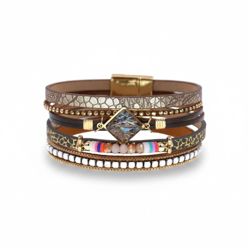 Boho layered, magnetic closure bracelet with faux leopard and brown faux leather, faceted beads,  silver and gold accents on a white background
