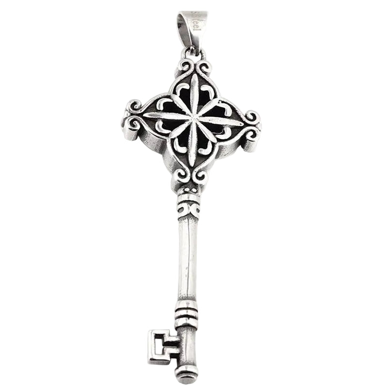 Decorative stainless steel 316L Key Pendant with intricate designs on a white background, measured against a ruler.